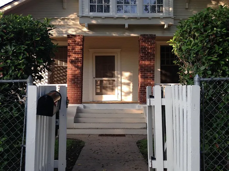 Front View of street to door access. This iconic home features architecture rarely seen in the newer homes. Classic 1920s iconic architectural features abound from roof to porch, from front door to back door. A truly classic vintage home, worth a view,