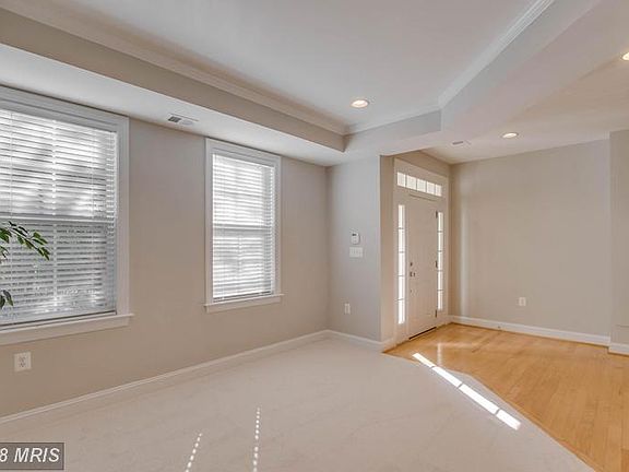 LIght and bright entrance foyer and lower level