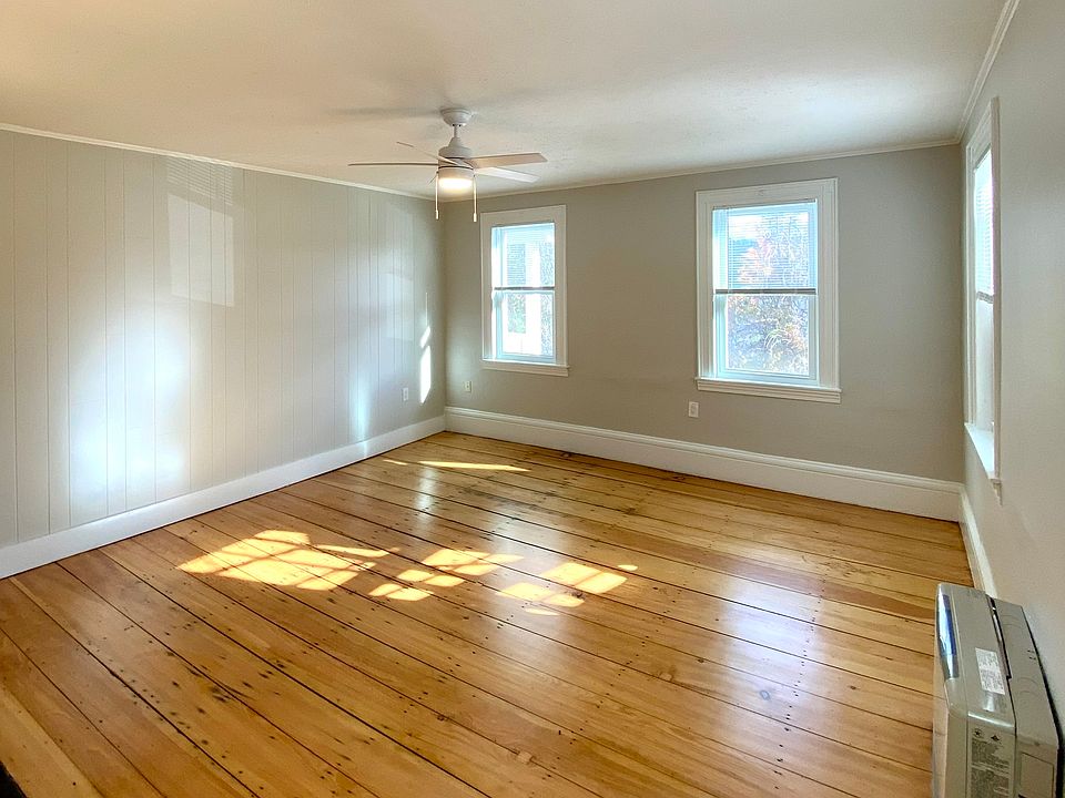 Newly refinished, original wide plank wood flooring