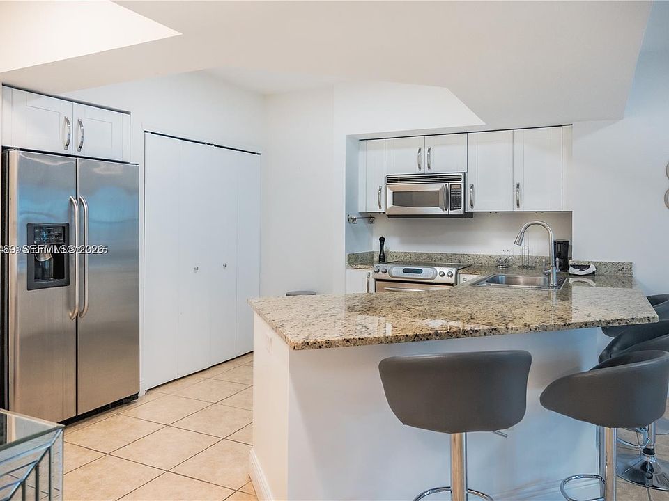 1st image of 19900 E Country Club Dr APT 318