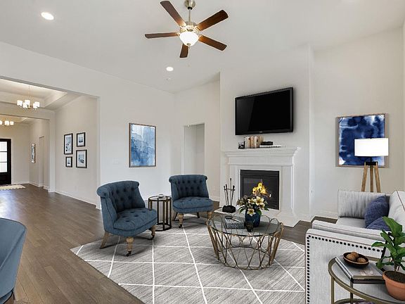 Beautiful mantel on fireplace in great room, virtually staged for demonstration