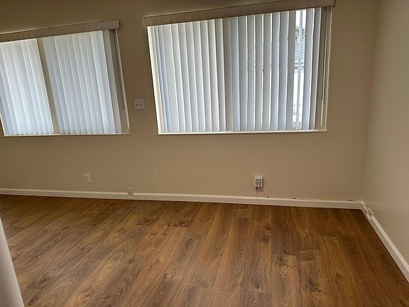 Dining area (Right window). Left window in LR/entry. Double pane windows throughout.