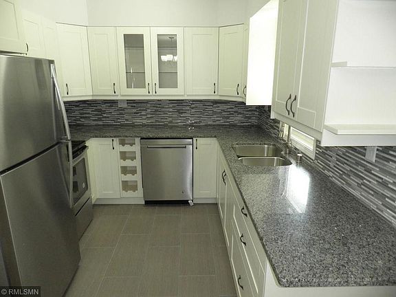 New kitchen with granite and stainless steel appliances