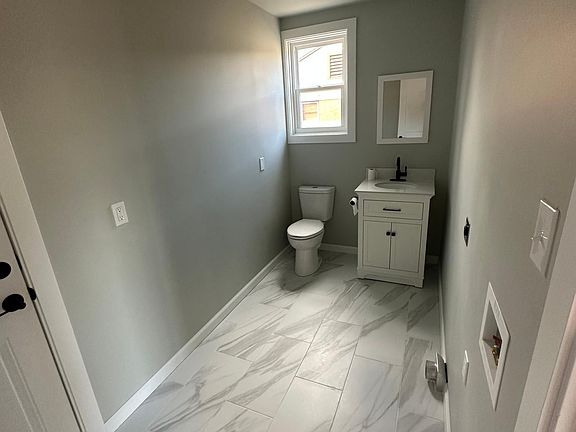 The house does come with washer or drying but it is not shown in the picture. ;