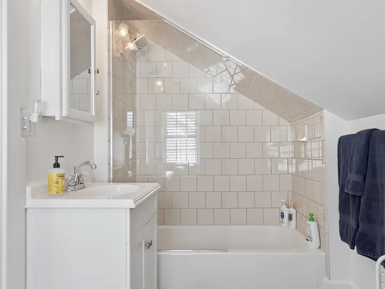 Enjoy the convenience of a dedicated ensuite bath tucked quietly within the upstairs retreat.