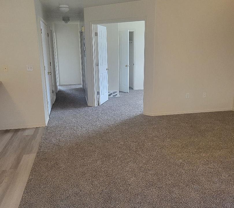 Living Room with double doors into Den