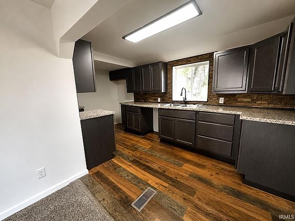 5th image of 301 N Starke St