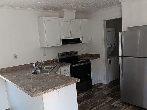 New, white kitchen cabinets 