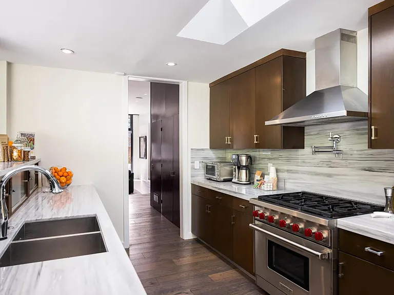 Equipped with essential amenities like bowls, pots and pans, oil, salt, and pepper.