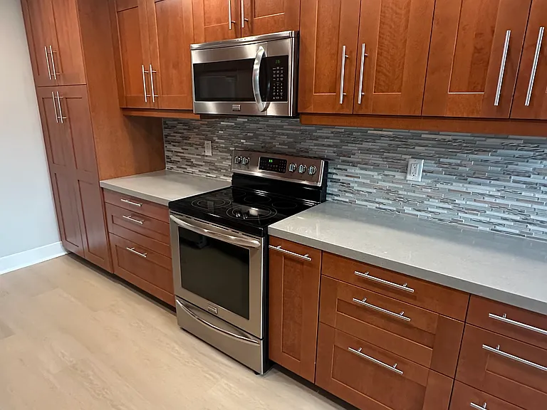 Kitchen right, Large Pantry with adjustable shelves, Pots and Pan Drawers instead of cabinet doors.