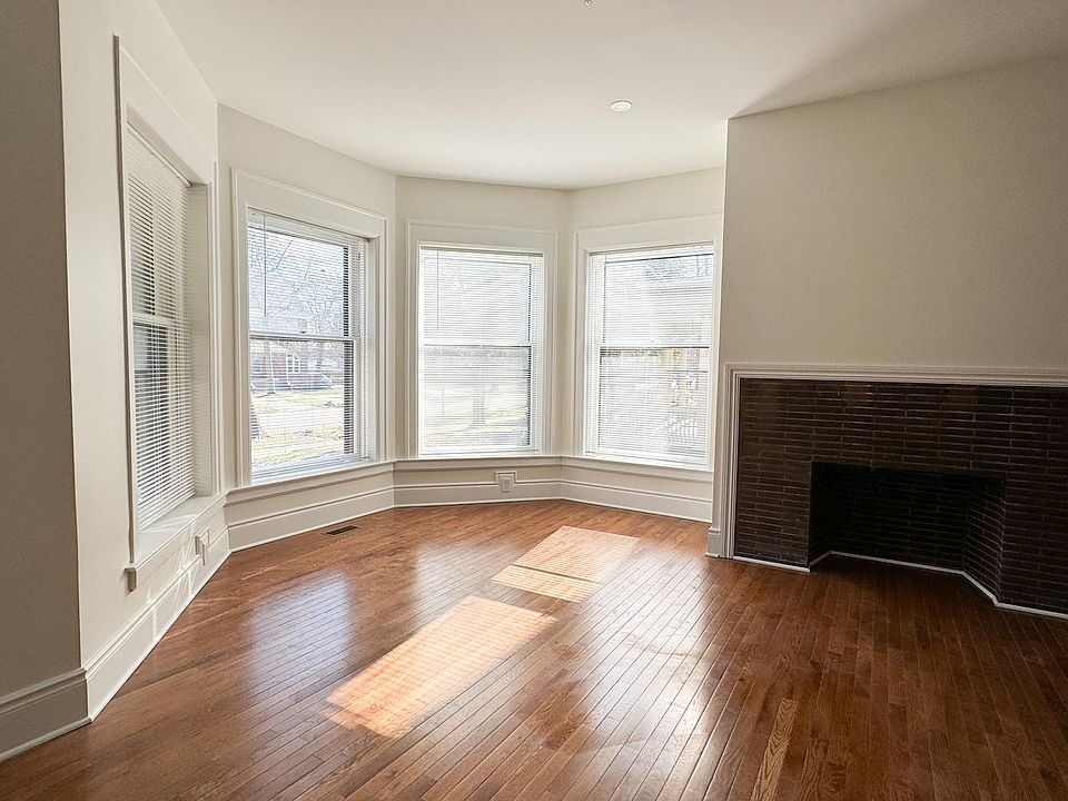 Dining area with original fireplace.