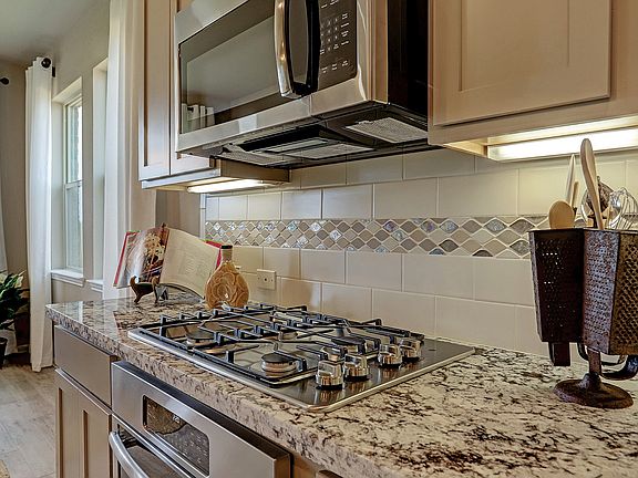 Gourmet kitchen with stainless appliances