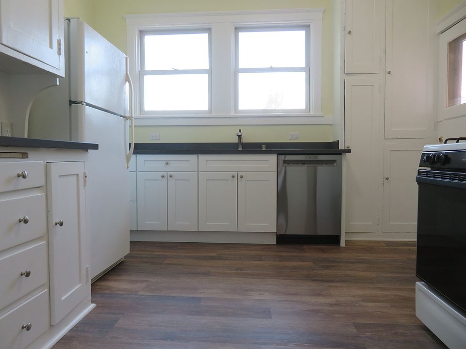 Updated spacious kitchen with dishwasher, garbage disposal, and gas stove