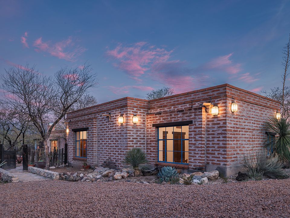 North facade and entry gate from parking area