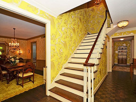 INVITING ENTRY BOASTS GRACIOUS STAIRWAY