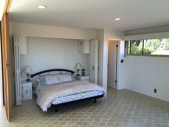 Bedroom area with screen almost closed