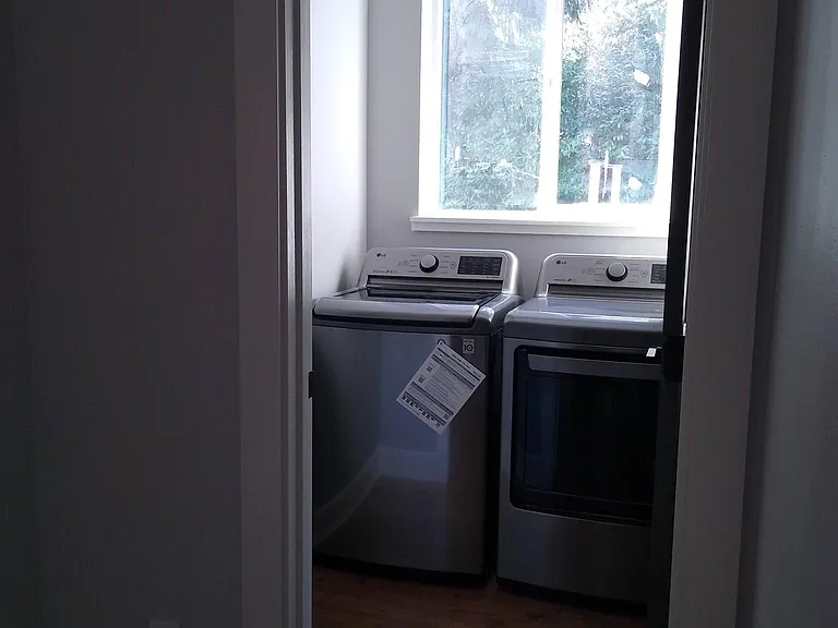 Laundry room - new washer and gas dryer included.