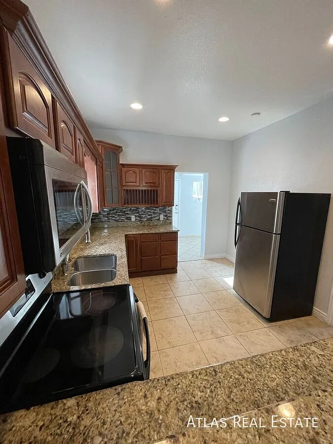 Coming Soon Historic Baker Charmer With Exposed Brick, Private Yard & 2-Car Garage — Photo 4