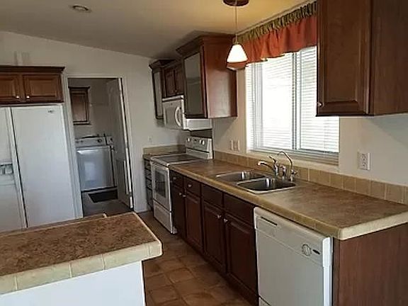 5th image of 13827 E 49th Ln