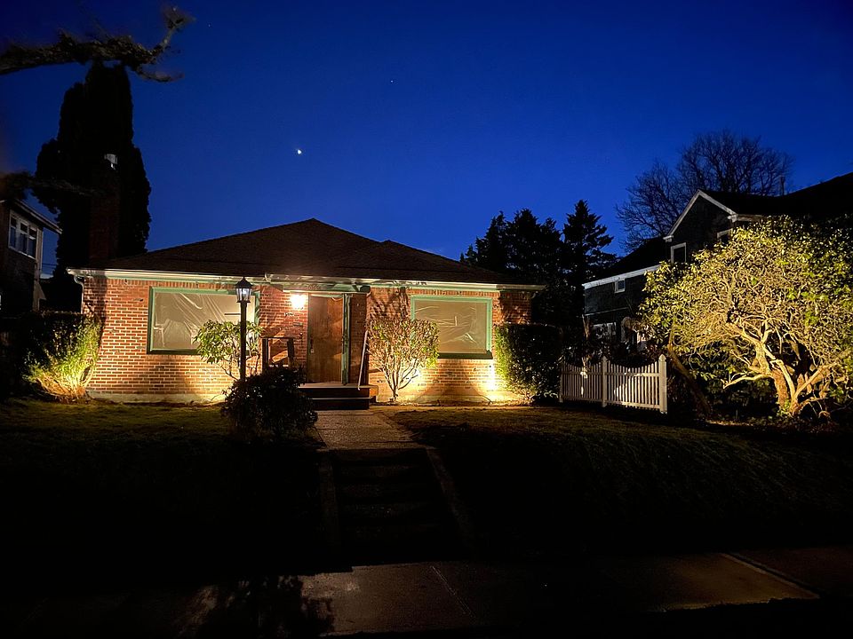 front of house with landscape lighting