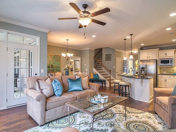 The Arlington Living Area This is a model representation, not the actual home