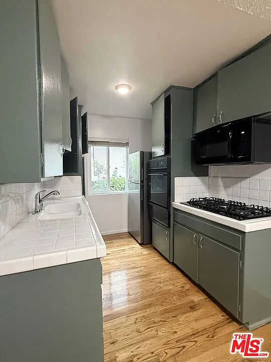 14930 Magnolia Blvd — Photo 2