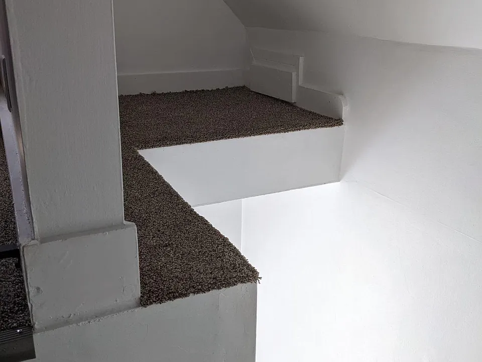 Storage area above stairway