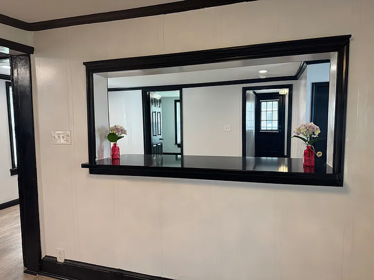 Amazing serving hatch between kitchen and living room