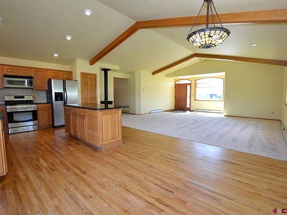 View from back of house in dining area towards front entry.