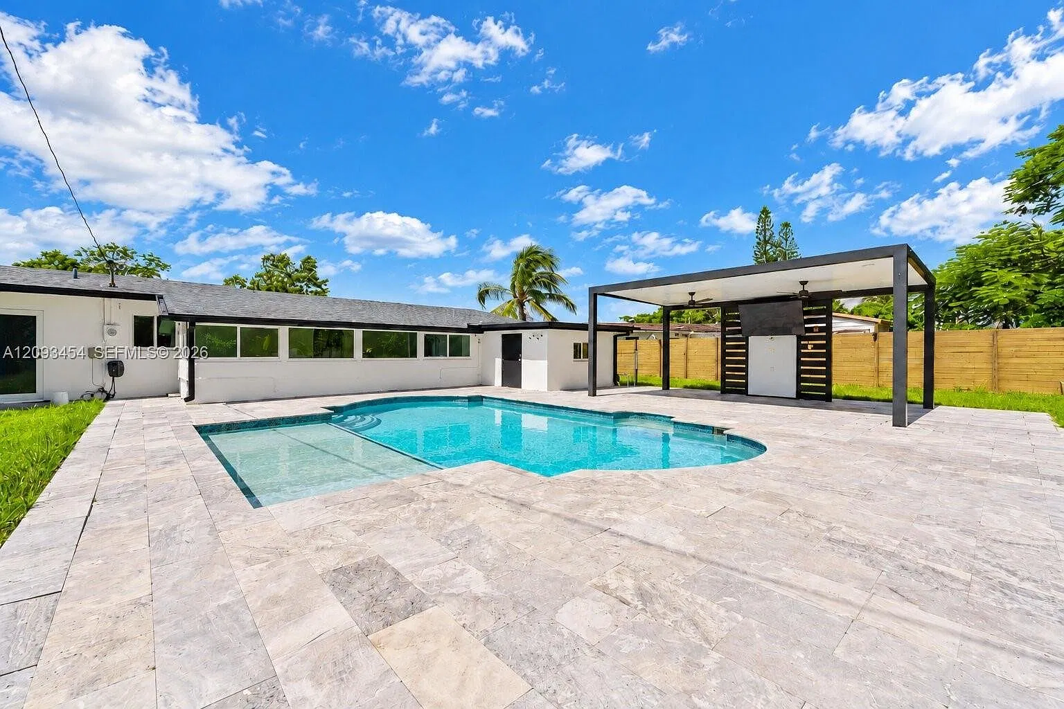 Enjoy your own private tropical retreat in this beautifully upgraded 4-bedroom, 2-bath pool home — Photo 2