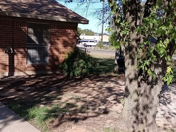 Duplex with Bosqueville School in Background