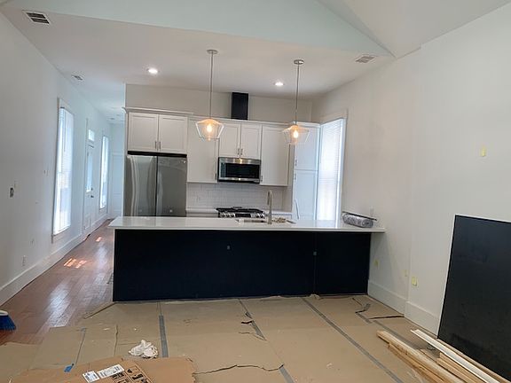 Looking at the fabulous kitchen from back of great room.