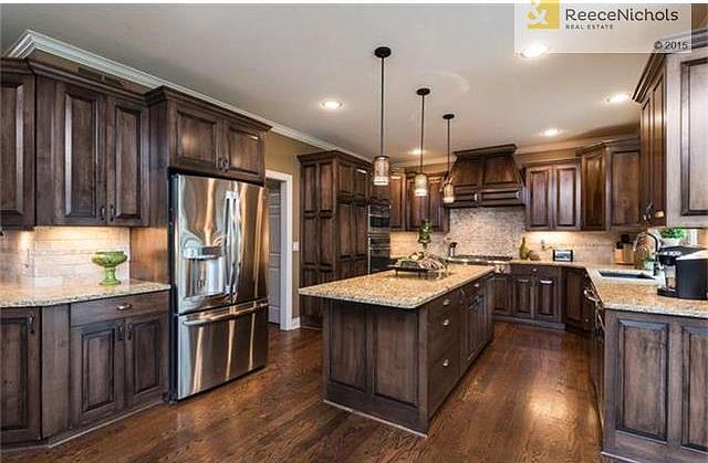 Recently updated kitchen with custom cabinets and granite countertops