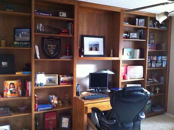 Built-in desk and shelving in study