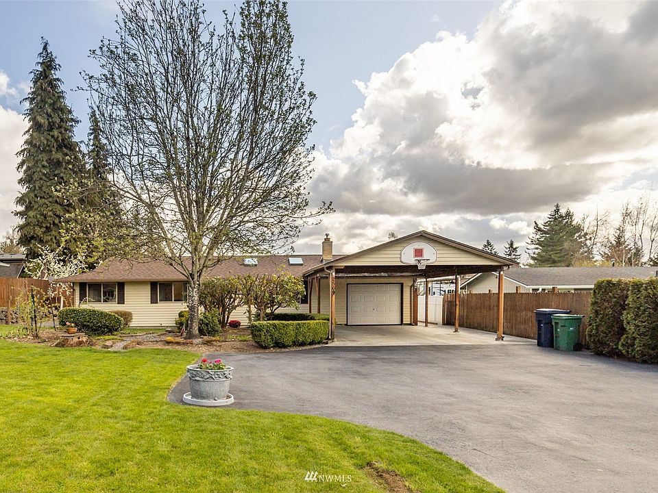 Welcome home! This expansive driveway has enough room to park all of your toys!