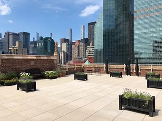 Rented by E Realty International Corp | media 13