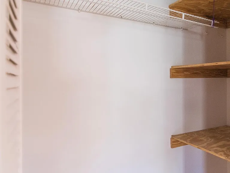 main closet with shelving