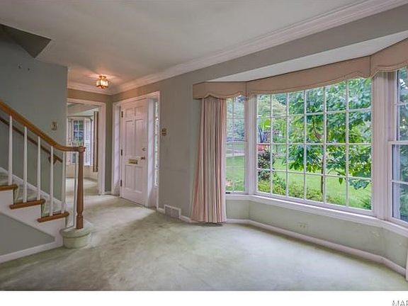 One of the bay windows is in the living room, as seen here.