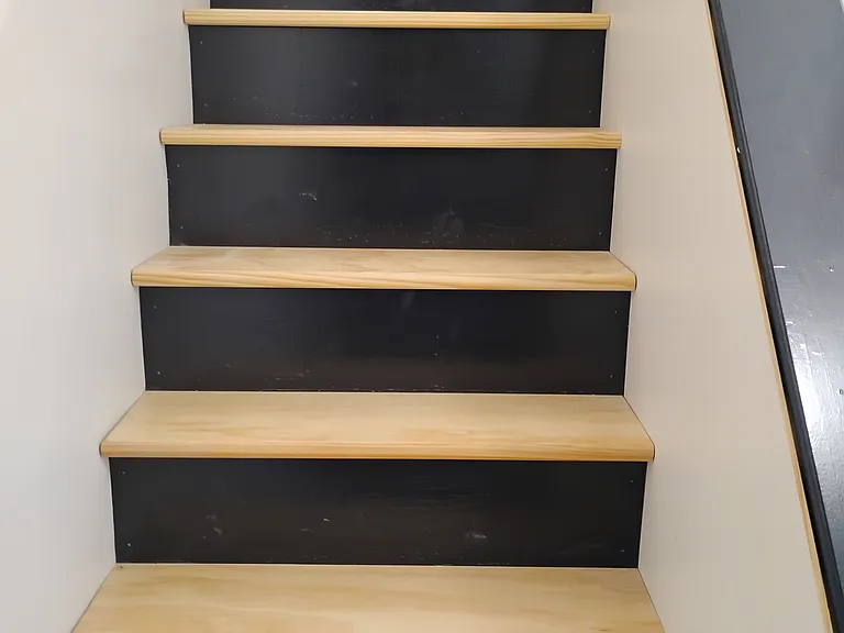All new staircase, handrail and walls freshly painted in Antique White.