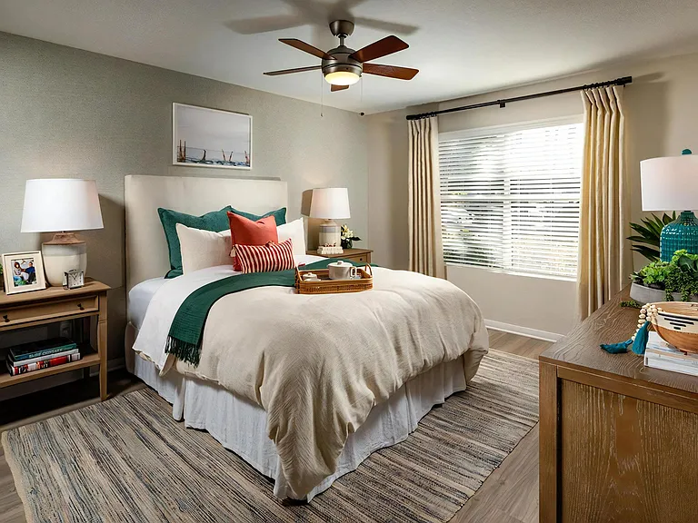 Large Windows Allow in Plentiful Natural Light Featuring 2 Faux Wood Blinds