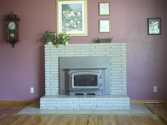 Fireplace with woodstove insert