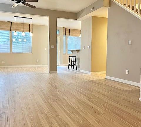 Entry into family room, updated with wood flooring