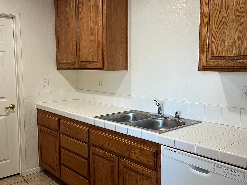 kitchen, across from the stove & fridge