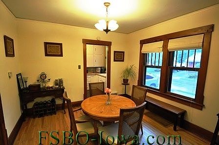 Dining Room - roman shades and storm windows throughout, southern exposure