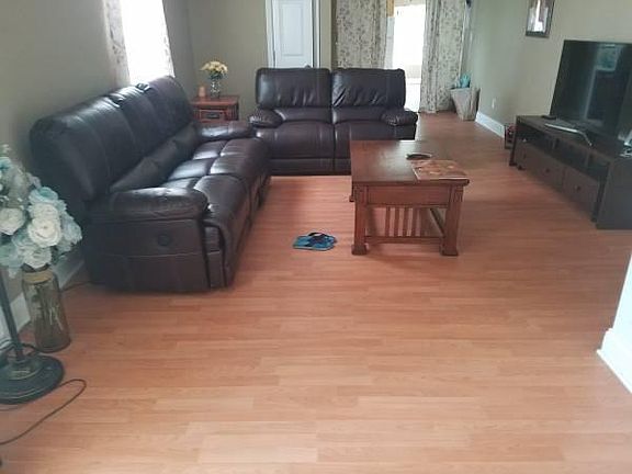 Older Flooring, It has been updated and replaced. This photo helps to see the space size.