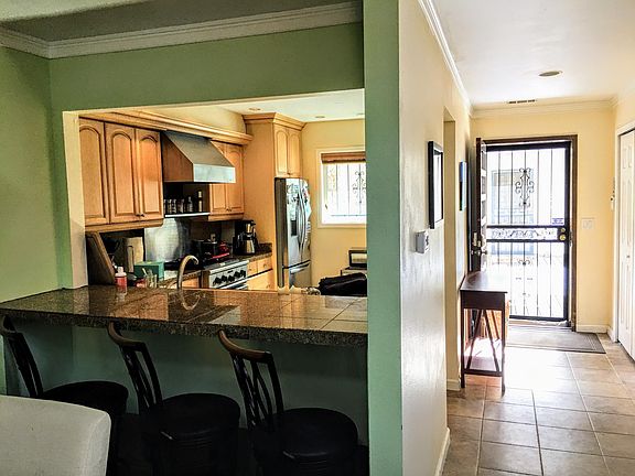 Open kitchen with granite bar