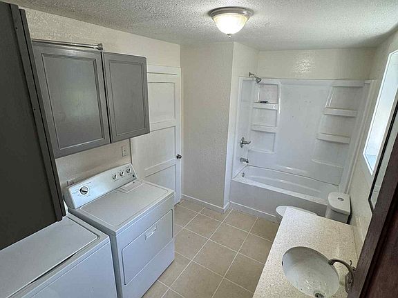 Bathroom with laundry