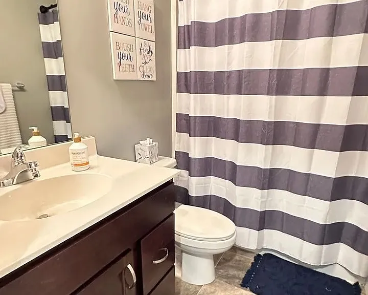Step into modern comfort with our stylish bathroom featuring sleek finishes and a serene color palette. Relax and rejuvenate in this inviting space. Upgrade your lifestyle todaya"schedule a tour and see it for yourself!