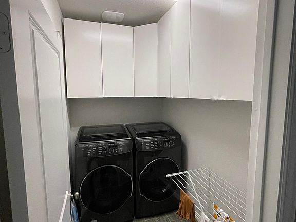 laundry room with storage