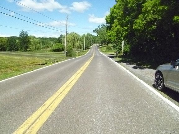 4th image of Holmes Road